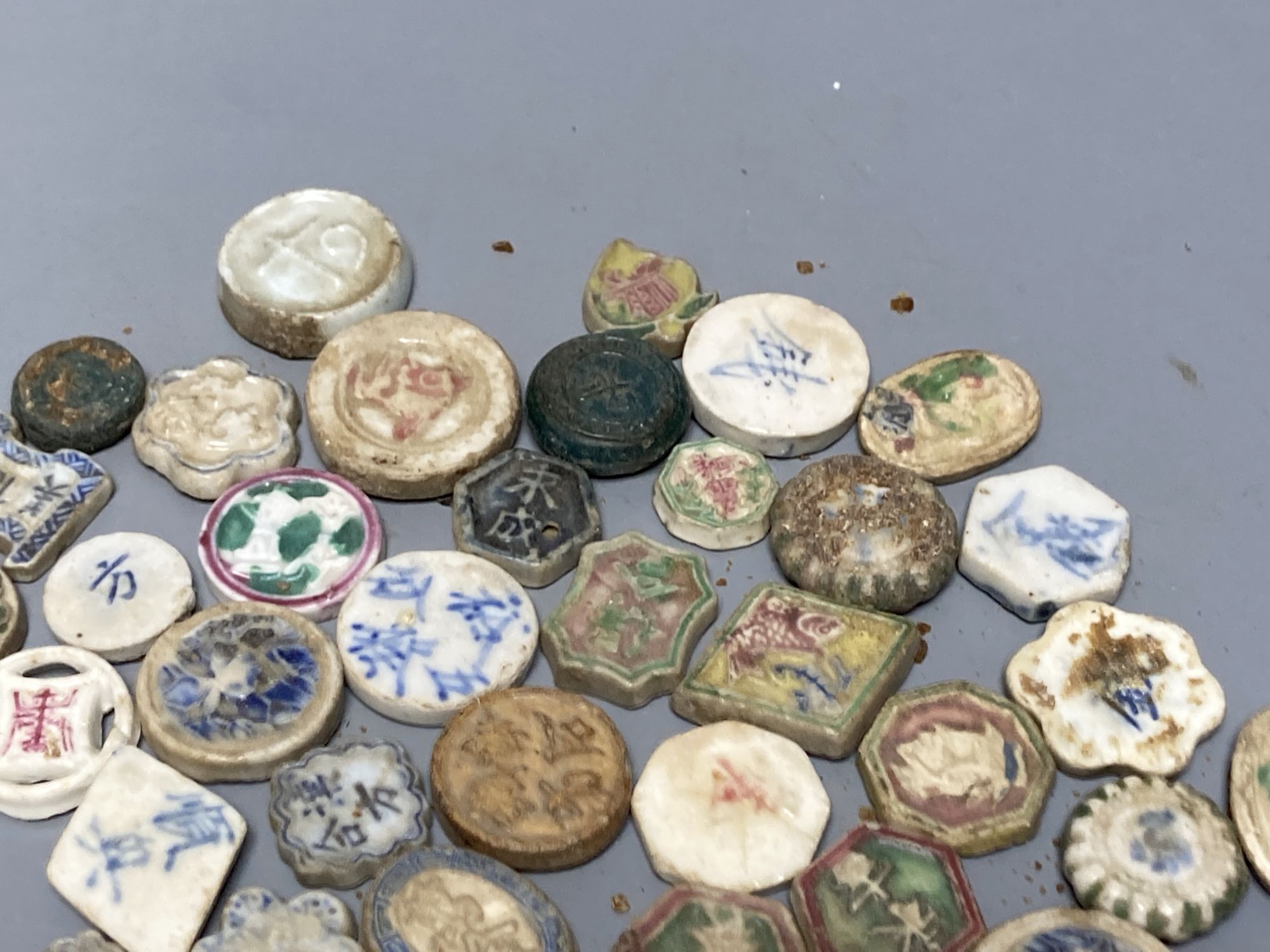 A group of Siamese porcelain gaming counters